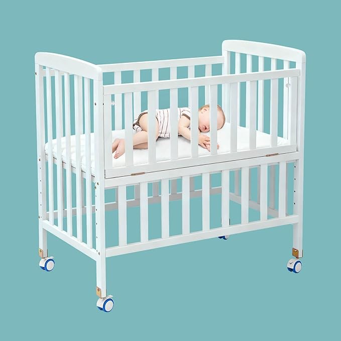Portable Mini Baby Crib - Convertible Baby Cribs with Soft Foam Mattress(33 * 20"),6 Heights Bedside Bassinet Sleeper,Wheeled Bedside Crib Co Sleeper for Small Space,White