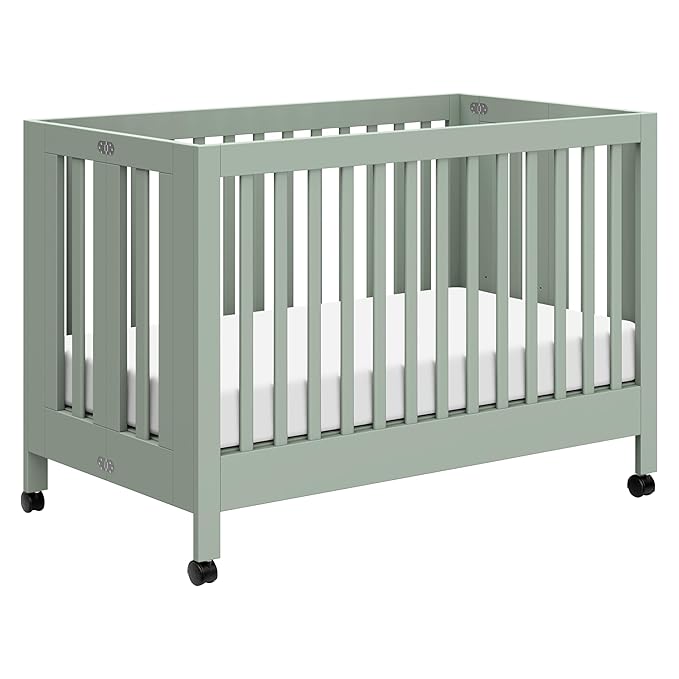 babyletto Maki 2-in-1 Portable Folding Crib with Toddler Bed Conversion Kit in Light Sage, Greenguard Gold Certified