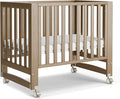 MAMAZING EvoNest Baby Crib, 6 in 1 Convertible Mini Crib with Wheels, 100% New Zealand Pinewood Growing Bed, 4 Adjustable Mattress Height,GREENGUARD Gold Certified,Brown