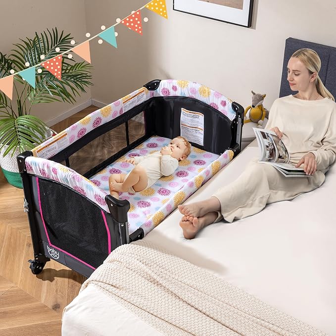 BABY JOY 4 in 1 Pink Pack and Play, Baby Bedside Sleeper with Bassinet, 3 Adjustable Heights, Music Box, Easy to Install, Foldable Bedside Crib w/Changing Table, Playards from Newborn to Toddlers Rose