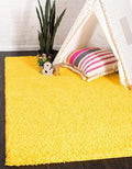 Unique Loom Solid Shag Collection Area Rug (6' 1" x 9' Rectangle, Tuscan Sun Yellow)